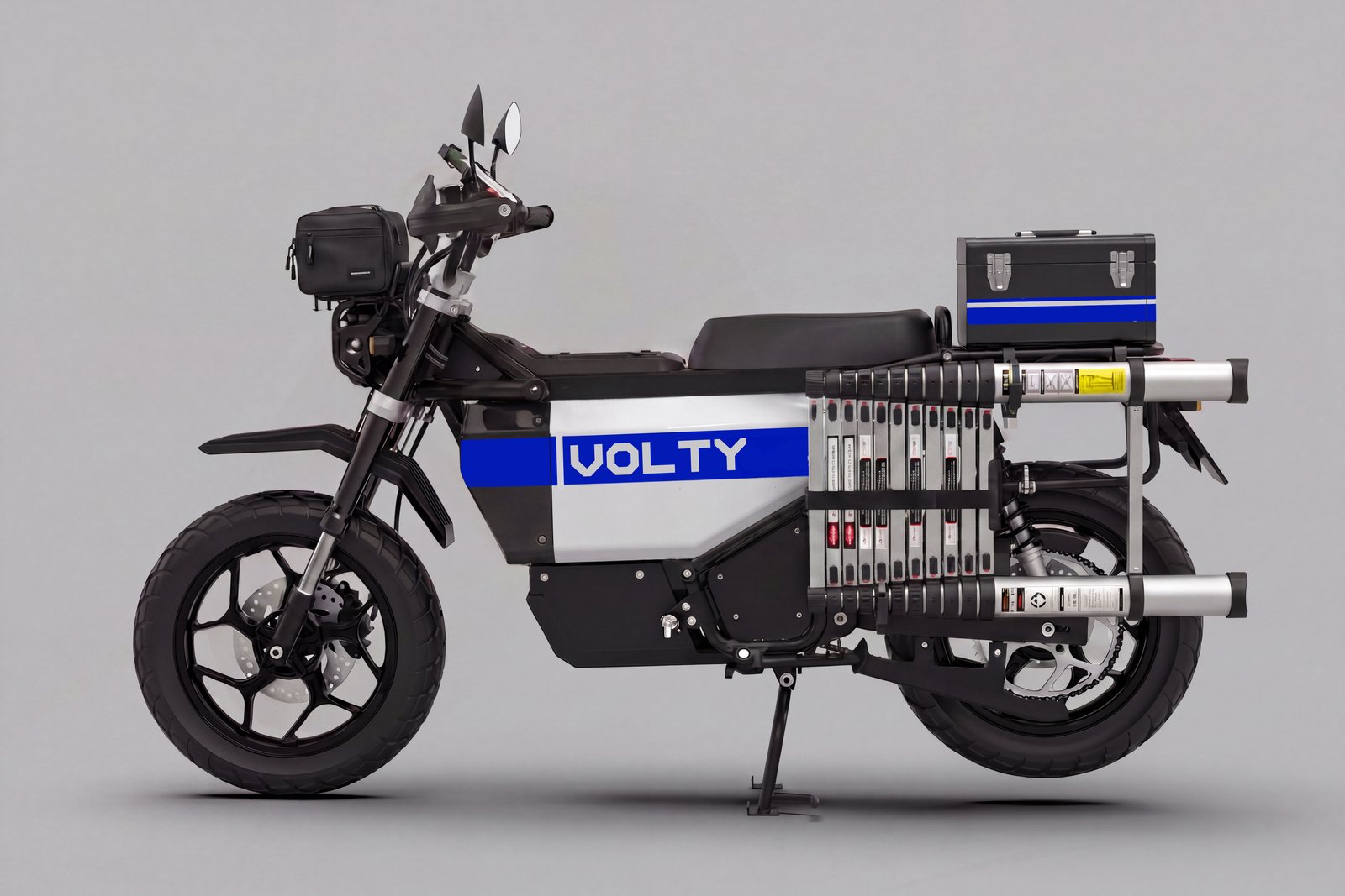 Telescopic ladder on the side frame, locking toolbox on the rear deck, kit bag on the front rack.